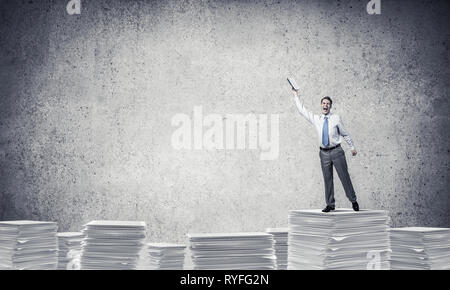 Fleißig, um erfolgreicher Geschäftsmann zu werden. Stockfoto