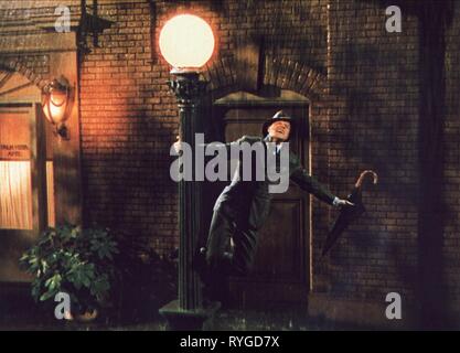 GENE KELLY, SINGIN' IN THE RAIN, 1952 Stockfoto