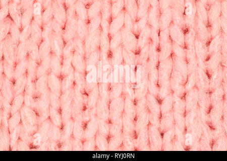 Echten rosa stricken Textur. Hintergrund, Muster Konzept. Gestrick aus heathered Garn Stockfoto