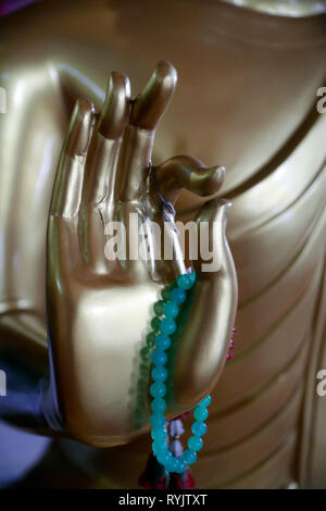 Pitu Khosa Rangsay buddhistischen Pagode. Hand des Buddha. Mudra: Geste der Argument. Close-up. Can Tho. Vietnam. Stockfoto