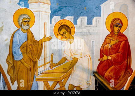 Fresko in der griechisch-orthodoxen Kirche der Mariä Verkündigung, Nazareth, Israel. Jesus in St Joseph's Tischlerei. Stockfoto