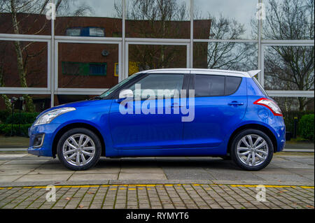 2014 Suzuki Swift SZ-L heiße Luke Compact Car Stockfoto