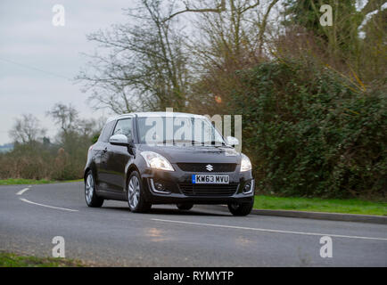 2014 Suzuki Swift SZ-L heiße Luke Compact Car Stockfoto