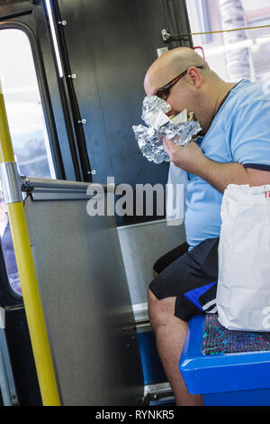 Miami Beach Florida, Metrobus, South Beach Lokal, öffentlicher Nahverkehr, Nahverkehr, Sitzplatz, Passagiere Reiter, lateinamerikanische lateinamerikanische Ethnie Stockfoto