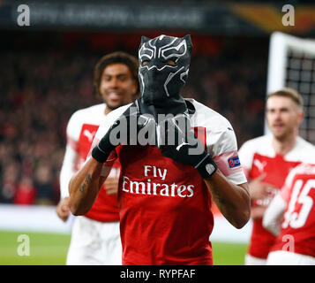 London, Großbritannien. 14 Mär, 2019. Pierre-Emerick Aubameyang von Arsenal feiert sein Ziel Liga Runde 16 2. Etappe zwischen Arsenal und Rennes im Emirates Stadium, London, England am 14. Mär 2019. Credit: Aktion Foto Sport/Alamy leben Nachrichten Stockfoto