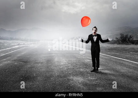 Junger Mann Mime. Mixed Media Stockfoto