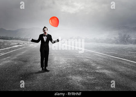 Junger Mann Mime. Mixed Media Stockfoto