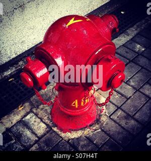 Red Fire Hydrant in der Straße von Hong kong Stockfoto