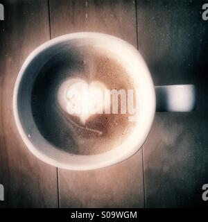Kaffee mit Herzform Stockfoto