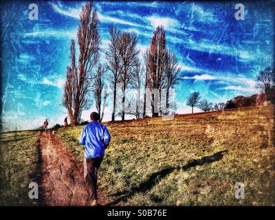 Joggen in Churchfields, Harrow-on-the-Hill, North West London, England, Vereinigtes Königreich, Europa Stockfoto