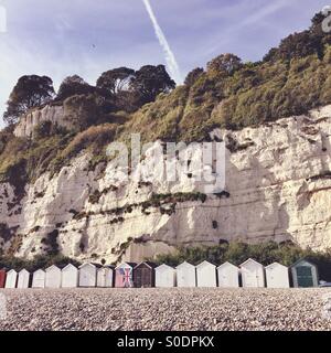 Strandhütten auf Bier Beach, South Devon Stockfoto