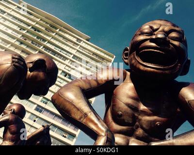 Lachende Männer Statuen in Vancouver Stockfoto