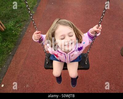 Swinging glücklich Stockfoto