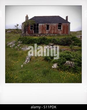 Alte verlassene Wellblech Croft auf der Insel Scalpay in den äußeren Hebriden oder Western Isles. Stockfoto