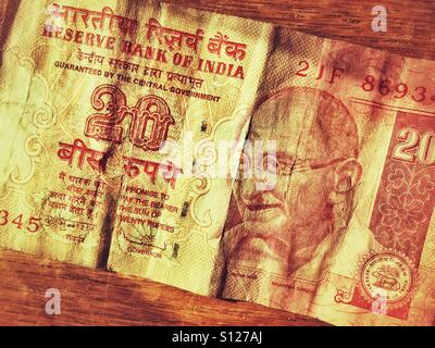 Die Serie 3 indischen 20 Rupien Note zeigt ein Porträt von Mahatma Gandhi und ist ein Teil der indischen Lion Capital Serie von Banknoten. Die indische Rupie ist gesetzliches Zahlungsmittel in Bhutan, Nepal & Simbabwe. Stockfoto