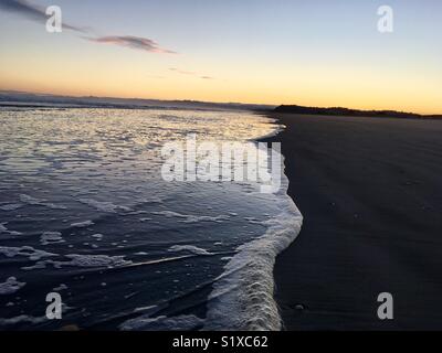 Sonnenaufgang am Strand Stockfoto