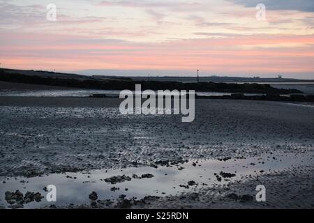 Sonnenuntergang über den Strand Stockfoto