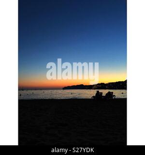 Sonnenuntergang am Strand Stockfoto