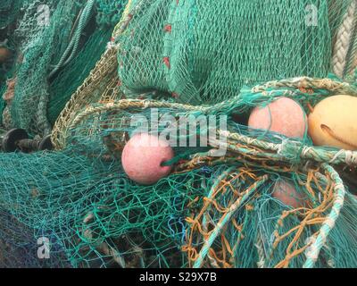 Fischernetze auf dem Cobb in Lyme Regis Stockfoto