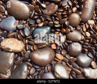 Nahaufnahme von glatte, glänzende Fluss Steine, USA Stockfoto