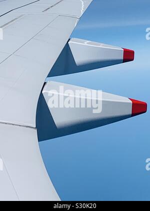 Part of airplane wing against the sky. Stockfoto