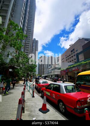 Toyota Komfort rote Taxis in Hongkong. Stockfoto