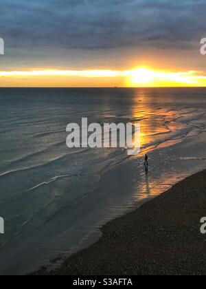 Sonnenuntergang über Brighton Beach. Stockfoto