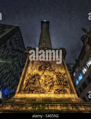 The Monument in London. built between 1671 and 1677 to commemorate the Great Fire of London and to celebrate the rebuilding of the City. Plaque sculpture is basso-relievo by Caius Gabriel Cibber Stock Photo