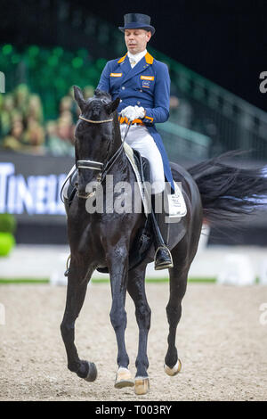 Den Bosch, Niederlande. 16. März 2019. Brabanthallen, Pferdesport, die Dutchmasters, FEI World Cupª Dressur Freestyle, Reiter Hans Peter Minderhoud (NED) mit Glock "s Dream Boy N.O.P. während der FEI World Cup Dressage Freestyle Stockfoto