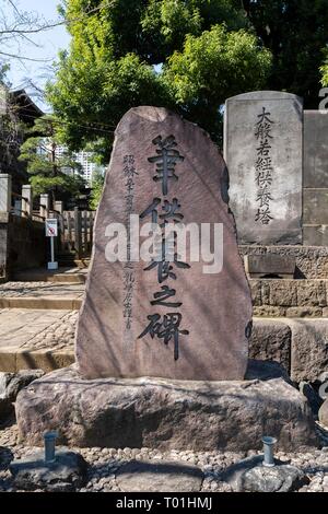 Schreiben Pinsel Trost Denkmal, Sengaku-ji, Minato-Ku, Tokyo, Japan. Stockfoto