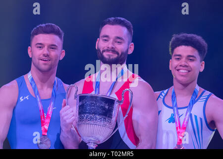 Liverpool, Großbritannien. 16. März 2019. James Hall ist der Meister der 2019 britischen Gymnastik Champions, Giarnni Regini-Morna (2.) und Jamie Lewis (3.) in Männer Senior Vielseitige während der 2019 Gymnastik Britischen Meisterschaften bei M&S Bank Arena am Samstag, den 16. März 2019. LIVERPOOL, ENGLAND. (Nur redaktionelle Nutzung, eine Lizenz für die gewerbliche Nutzung erforderlich. Keine Verwendung in Wetten, Spiele oder einer einzelnen Verein/Liga/player Publikationen.) Credit: Taka G Wu/Alamy News Credit: Taka Wu/Alamy leben Nachrichten Stockfoto