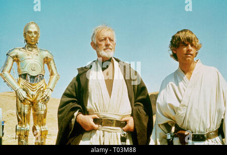 ANTHONY DANIELS, Alec Guinness, Mark Hamill, Star Wars: Episode IV - Eine neue Hoffnung, 1977 Stockfoto