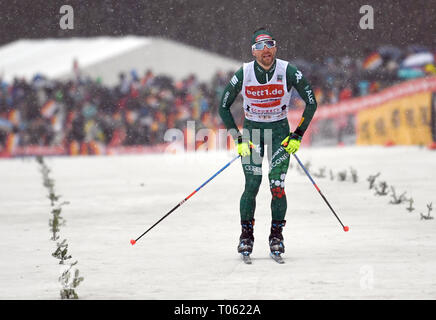 Schonach, Deutschland. 17 Mär, 2019. Nordic Ski/Kombination: Wm, single, normal Hill/10 km, Männer, Langlauf: Alessandro Pittin aus Italien am Ende. Er kommt im vierten. Quelle: Patrick Seeger/dpa/Alamy leben Nachrichten Stockfoto