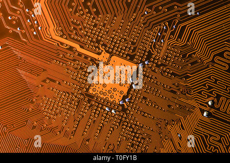 Nahaufnahme Foto von orange Fbg printecd Platine elektrische Pfade Stockfoto