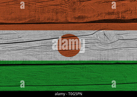 Niger Flagge auf alten Laufbelag gemalt. Patriotischen Hintergrund. Nationalflagge von Niger Stockfoto
