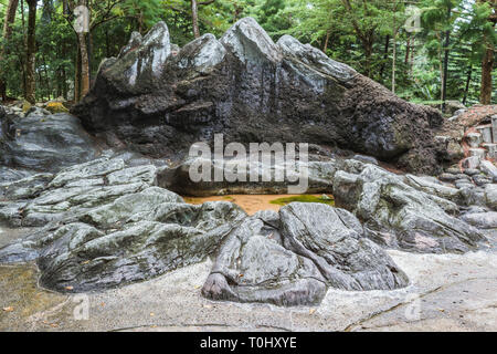 Prähistorische künstliche Landschaft vom berühmten Singapur Botanischen Garten Stockfoto