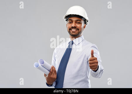 Architekt oder Geschäftsmann in Helm zeigt Daumen hoch Stockfoto