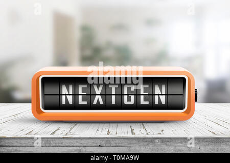 Nextgen Wort auf ein Alarmgeber in oranger Farbe auf einer hölzernen Schreibtisch im Wohnzimmer Stockfoto
