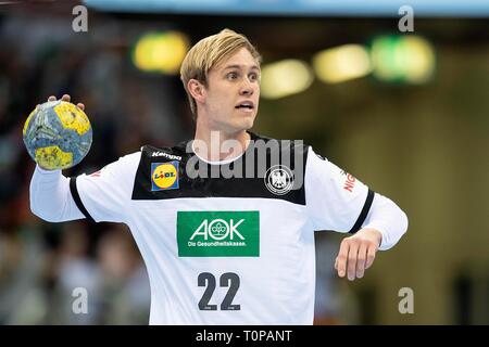 Marian MICHALCZIK (GER), in Aktion mit Kugel, halb Bild, halb Abbildung; Handball Laenspiel der Maenner, Freundschaftsspiel, Deutschland (GER) - Schweiz (SUI) 27:29 in Düsseldorf / Deutschland am 09.03.2019 | Verwendung weltweit Stockfoto