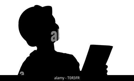 Silhouette weiblichen Bauingenieur mit einem Tablet-PC auf einer Baustelle. Stockfoto