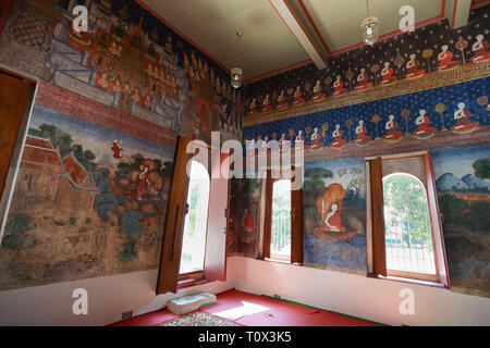 Uthai Thani, Thailand - Januar 12, 2019: Der berühmte schöne Buddhismus Wandgemälde im Wat Ubosatharam in Uthai Thani Thailand. Stockfoto