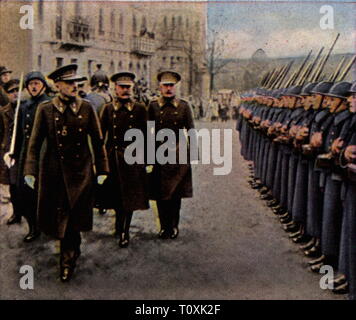 Alliierte Besetzung des Rheinlandes 1918 - 1930, Parade der belgischen Truppen in Aachen, Januar 1927, Farbfoto, Zigarette Karte, Serie 'Die Nachkriegszeit', 1935, Berufe, Rheinland, Beruf, Leistung zu besetzen, Besatzungsmächte, Belgien, Militär, Armee, Streitkräfte, Offiziere, Beamte, Soldaten, Soldaten, Menschen, Preußen, Rheinprovinz, Nordrhein-Westfalen, NRW, Nordrhein, Westfalen, Nordrhein-Westfalen, Nordrhein-Westphalen, Deutschland, Deutsches Reich, Weimarer Republik, 1920, S, 20. Jahrhundert, Parade, Paraden, Farbig, farbig, Nachkriegszeit pe, Additional-Rights - Clearance-Info - Not-Available Stockfoto