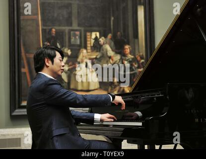 Madrid, Spanien. 21 Mär, 2019. Chinesische Pianist Lang Lang im Museo del Prado als Teil der laufenden Feierlichkeiten zum 200. Jahrestag der wichtigsten spanischen National Art Museum im Zentrum von Madrid, Spanien, 21. März 2019. Lang Lang durchgeführt, in der Halle zu Diego Velazquez, einer von Spaniens berühmtesten und beliebtesten Künstler gewidmet, und in Anwesenheit der berühmtesten Velazquez Gemälde "Las Meninas". Quelle: Guo Qiuda/Xinhua/Alamy leben Nachrichten Stockfoto