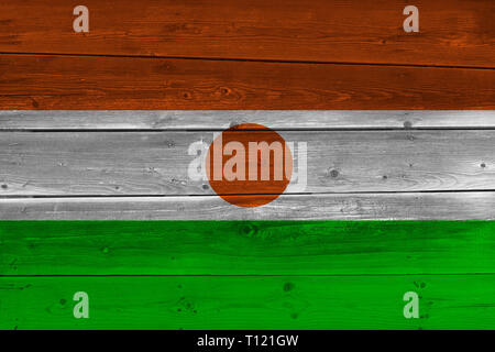 Niger Flagge auf alten Laufbelag gemalt. Patriotischen Hintergrund. Nationalflagge von Niger Stockfoto