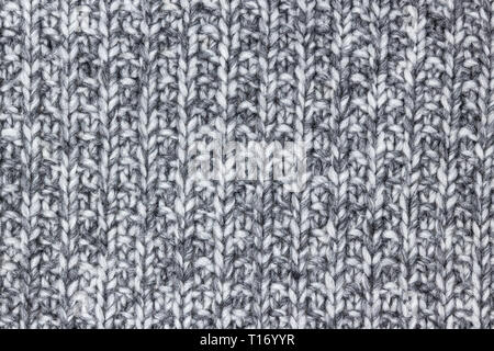 Grau gestrickte Wolle Textur, Detail einer chunky warme Decke. Stockfoto