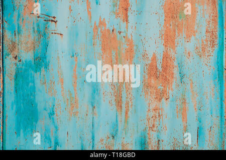 Alten Grunge rostiges Metall Metallic farbigen Hintergrund. Bunte Blau und Orange Abstrakt metallische Oberfläche. Stockfoto