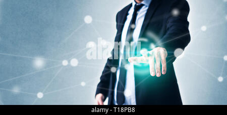 Man zeigt mit dem Finger auf virtuellen Bildschirm mit Technologie in Geschäftskonzept und glühenden Netzwerk Stockfoto