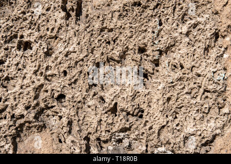 Beton Pflaster auf eine Hauswand als Hintergrund Grob Stockfoto