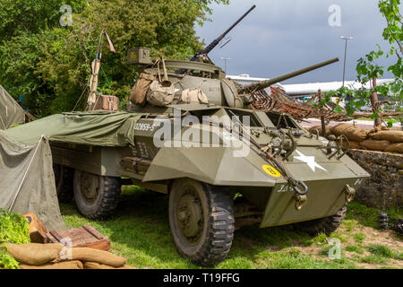 Eine M8 Light Armored Car, Teil der D-Day 70-Jähriges Jubiläum Veranstaltungen in Sainte-Mère-Église, Normandie, Frankreich im Juni 2014. Stockfoto