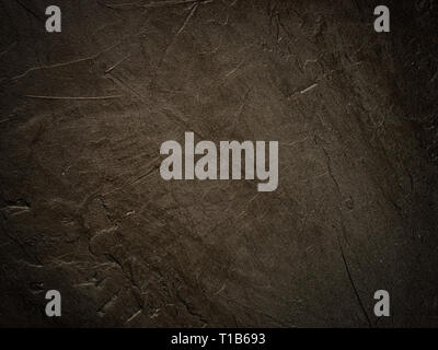 Dark grunge texturierte Wand als Hintergrund. Schwarz texturierter Hintergrund für Design oder Text. Platz kopieren Stockfoto
